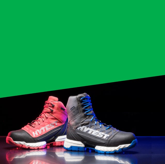 A pair of black Hytest Footrests 2.0 Rebound Hiker boots.