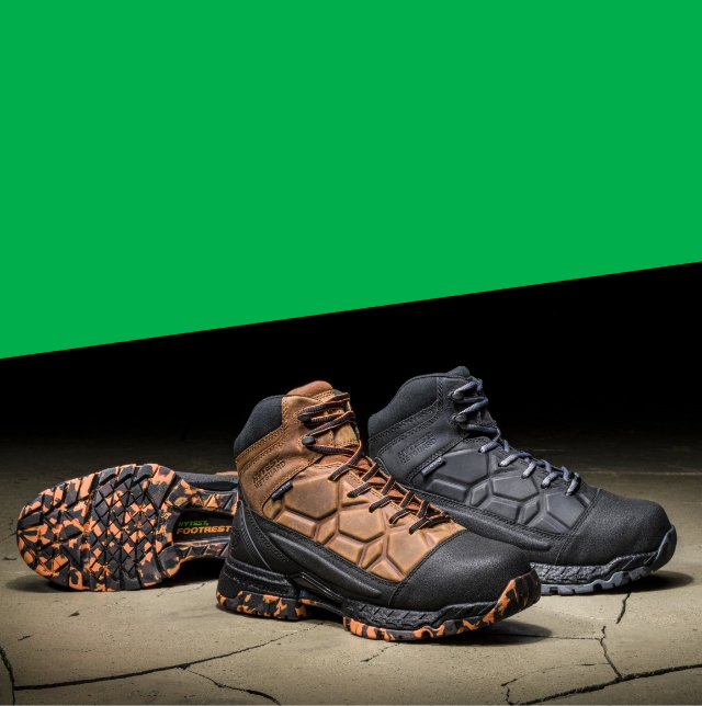 A pair of brown and black Hytest Footrests 2.0 Trio boots.